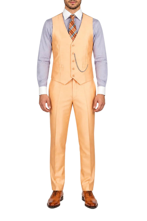 A man wearing a peach-colored three-piece suit with a matching vest and trousers, a light blue dress shirt, a patterned orange and blue tie, and brown leather dress shoes, standing against a plain white background.