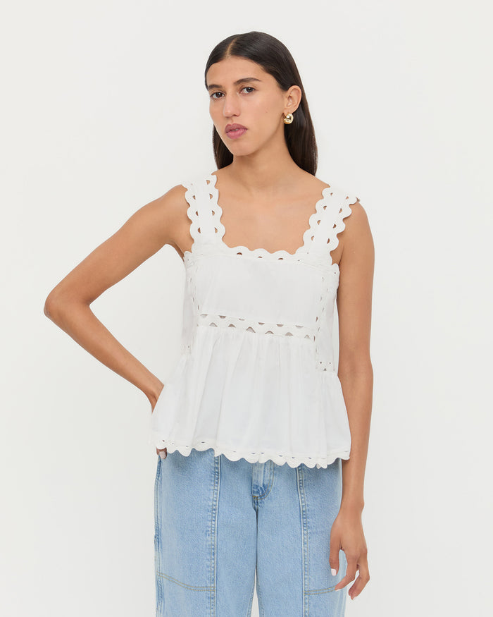Alyssa Lace Sleeveless Peplum Top in White and Molly Workwear Jean in light blue denim.