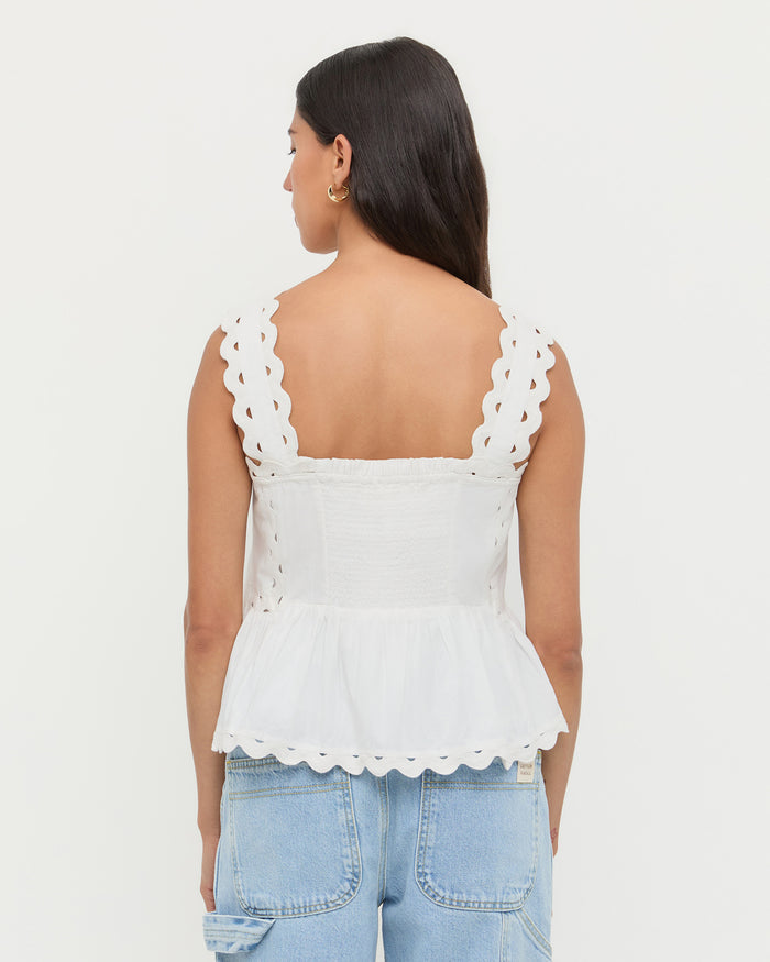 Alyssa Lace Sleeveless Peplum Top in White.