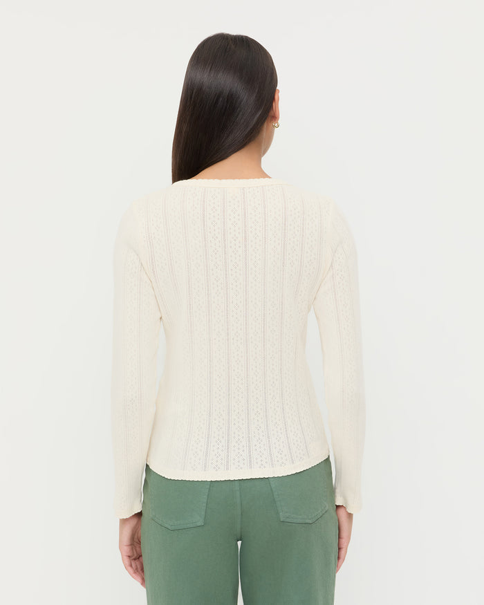 Ash Pointelle Cardigan, long-sleeve cardigan in cream pointelle cotton and Demi Embroidered Pant in sage green cotton.