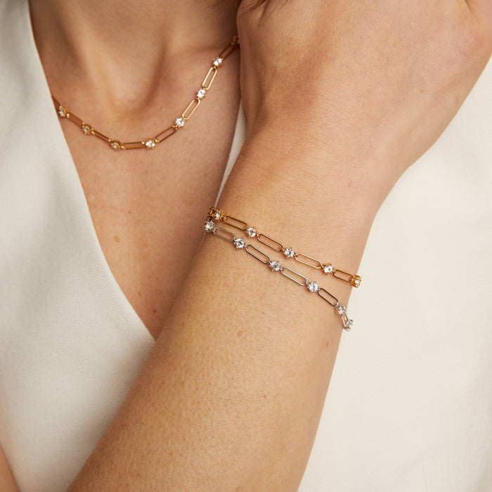 Model. Close up of woman wearing chain bracelet