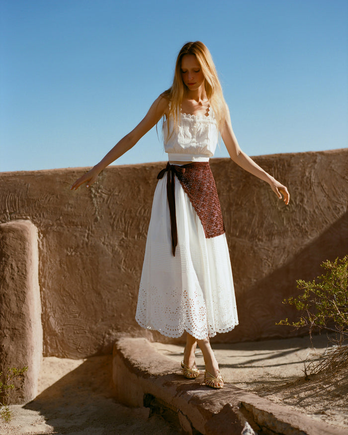 Betty Brown Crochet Apron, Tinsley Skirt in white cotton, and Runa Top in white cotton.