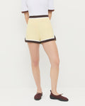 Billy Short in butter yellow fabric, Harly Tee in white cotton, and Raina Dark Brown Mesh Flat.