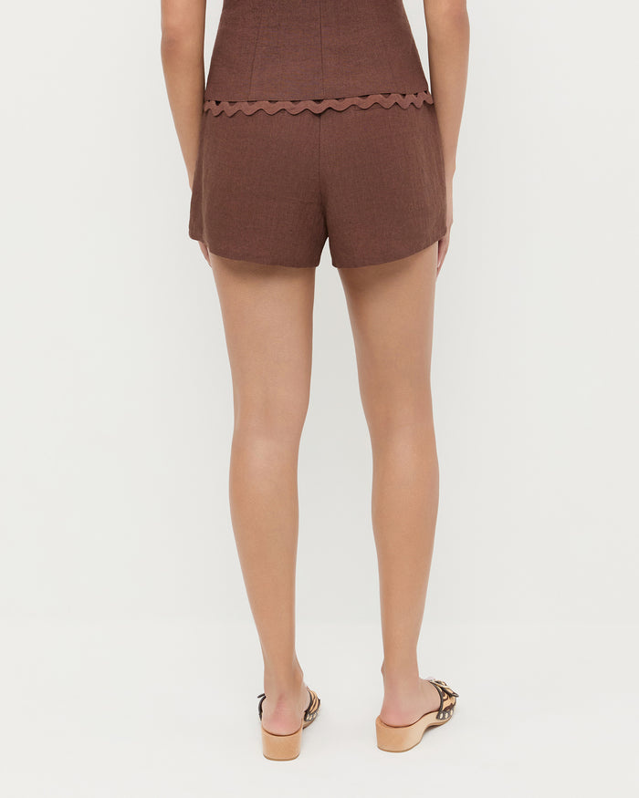 Carissa Short in brown linen, Teagan Top in brown linen, and Paulie Zebra Studded Sandal.