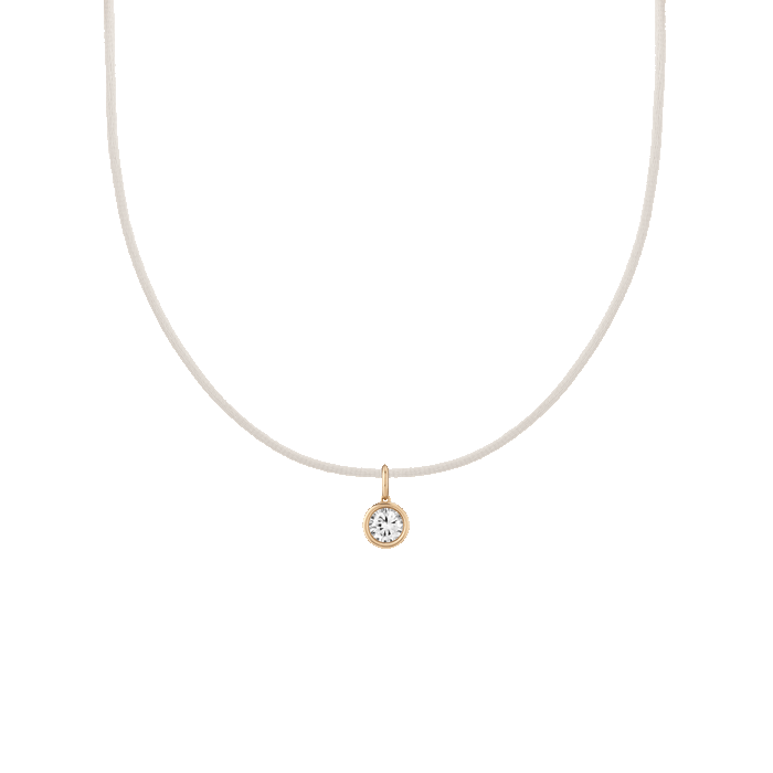 First. Gif of cord necklace with bezel white sapphire charm pendant.