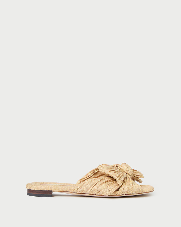 Daphne Natural Bow Slide Sandal in natural tan straw.