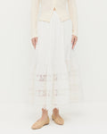 Delaney Midi skirt in cream cotton with lace detailing, Ash Cardigan in cream pointelle cotton, and Emery Natural Ballet Flat.