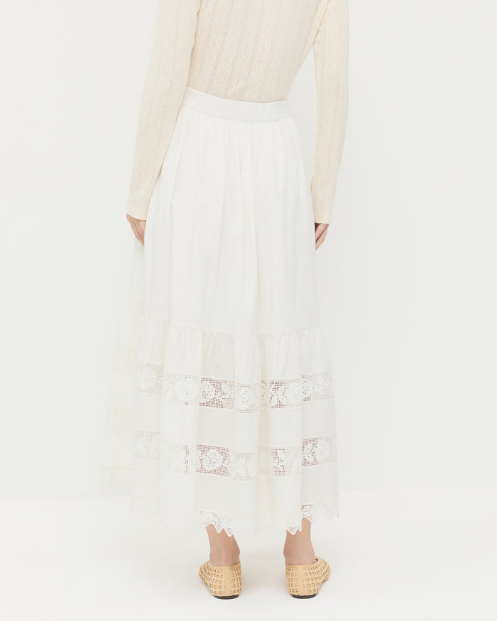 Delaney Midi skirt in cream cotton with lace detailing, Ash Cardigan in cream pointelle cotton, and Emery Natural Ballet Flat.