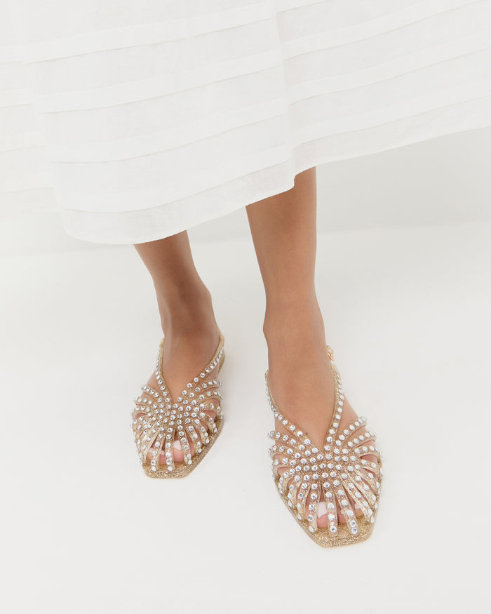 Devon Champagne Jelly Slingback Sandal in champagne jelly with crystal embellishments.
