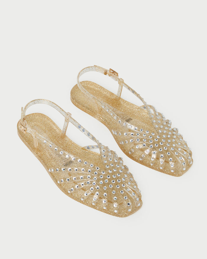 Devon Champagne Jelly Slingback Sandal in champagne jelly with crystal embellishments.
