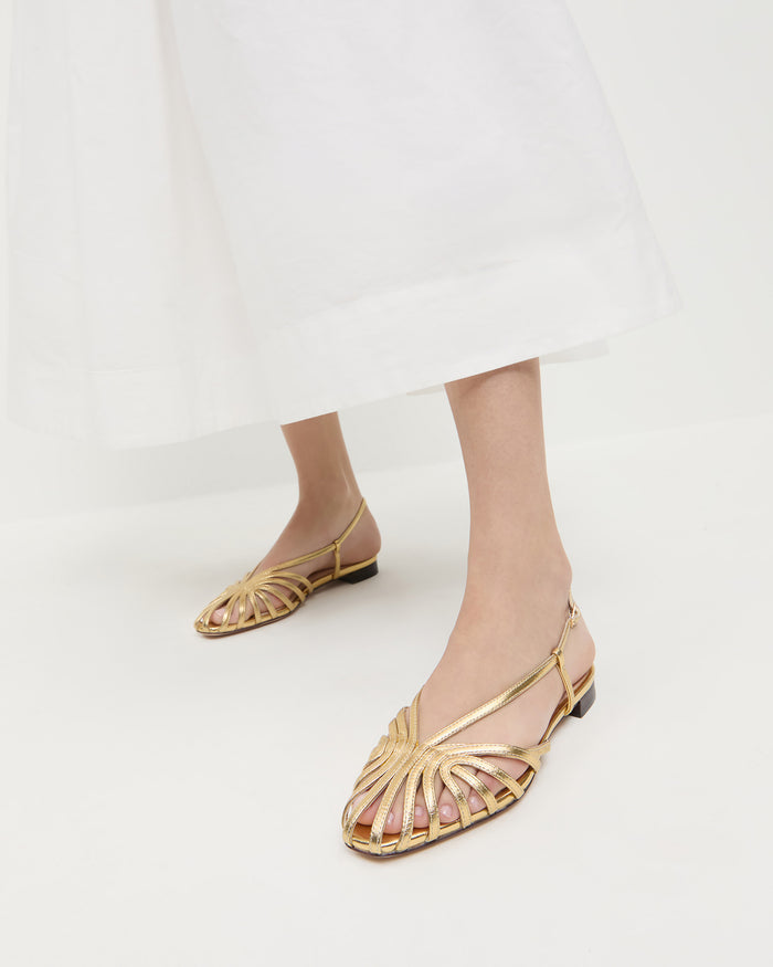 Devon Gold Slingback Sandal in gold leather and Estelle Dress in white cotton.