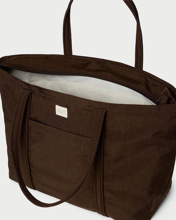 Dina Chocolate Travel Tote in chocolate brown water-resistant nylon.