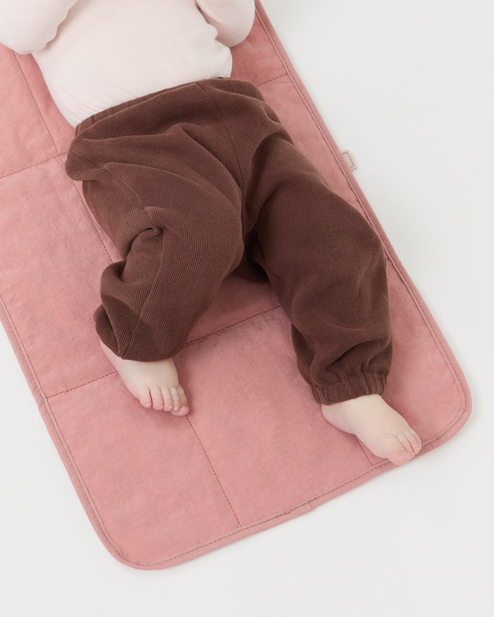 Dottie Pink Changing Pad in pink nylon.
