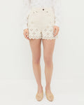 Dover Embroidered Short in natural denim, Twilla Embroidered Top in cream jersey cotton, and Emery Natural Ballet Flat.