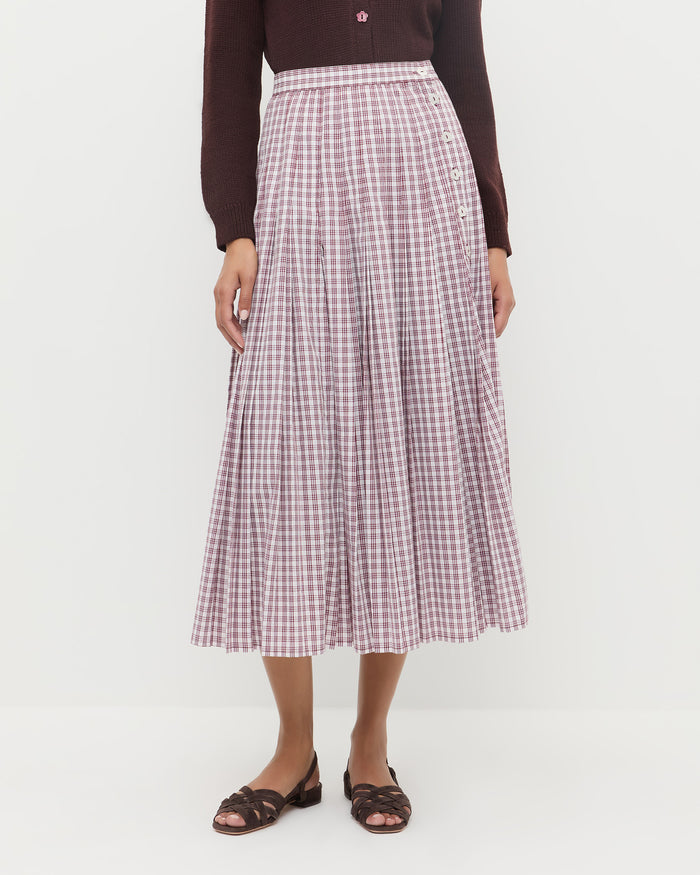 Emlyn Midi Skirt in cream, maroon, and lilac plaid cotton, Wynn Cardigan in dark brown wool, and Shelly Brown Suede Flat Sandal.
