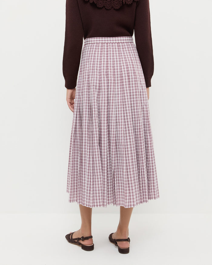 Emlyn Midi Skirt in cream, maroon, and lilac plaid cotton, Wynn Cardigan in dark brown wool, and Shelly Brown Suede Flat Sandal.