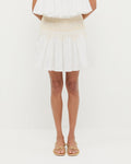 Florrie Mini Skirt in cream cotton, Nola Top in cream cotton, and Karly Gold Leather Strappy Sandal.