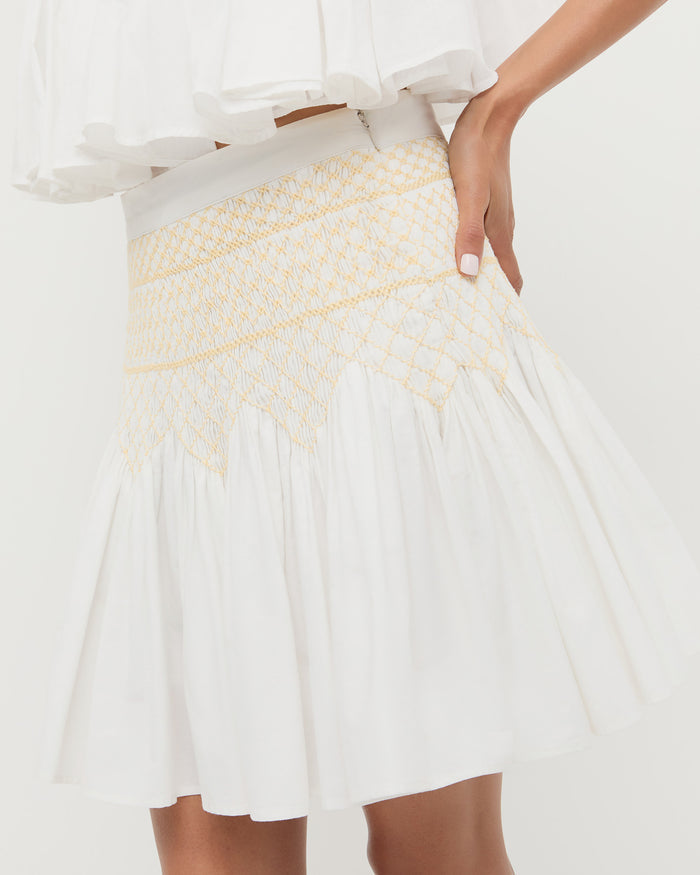 Florrie Mini Skirt in cream cotton and Nola Top in cream cotton.