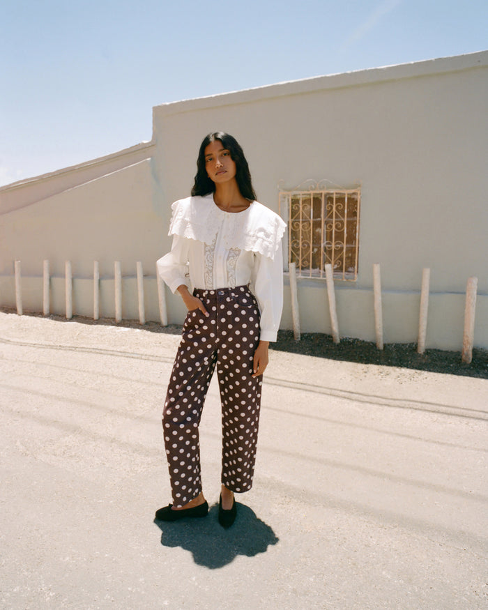 Gail Blouse in white cotton, Winona Denim Pant in brown and cream polka dot denim, and Noelle Brown Suede Ballet Flat.