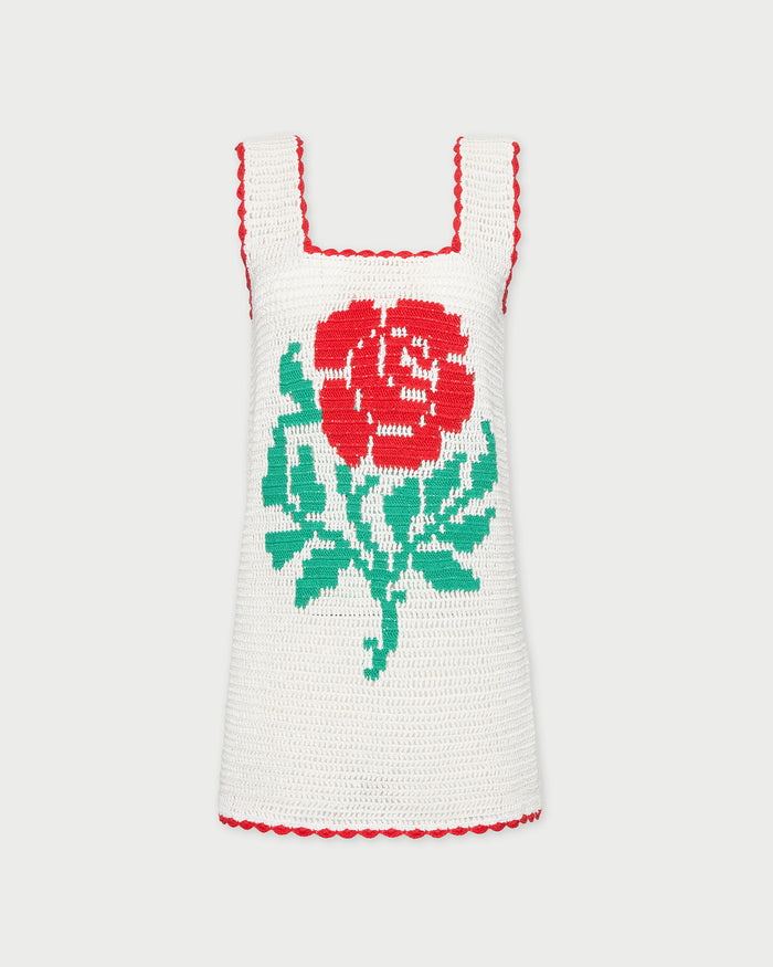 Helena Crochet Dress in cream hand-crocheted cotton with a red flower detail.