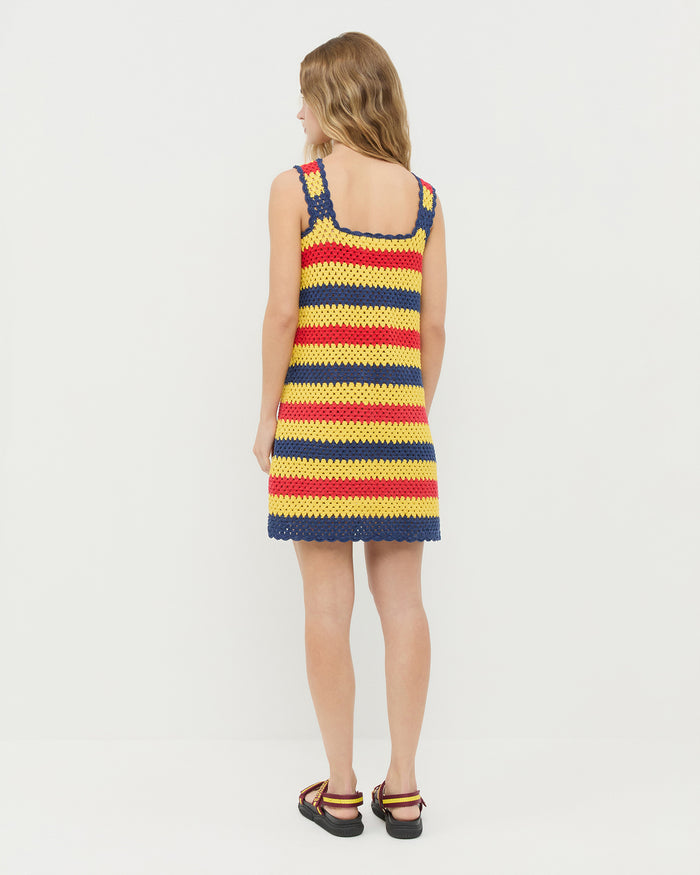 Helena Crochet Dress in yellow, red, and navy striped hand-crocheted cotton and Arlo Maroon/Yellow Sport Sandal