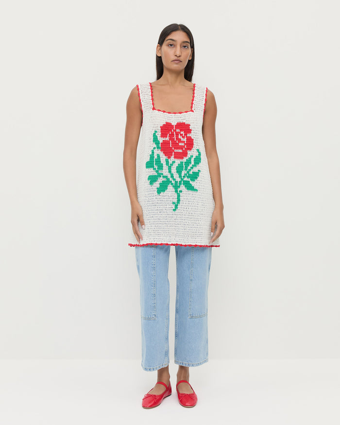 Helena Crochet Dress in cream hand-crocheted cotton with a red flower detail, Molly Workwear Jean in light blue denim, and Leonie Red Leather Ballet Flat.