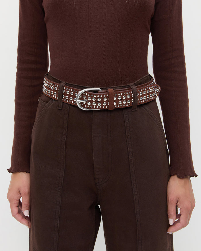 Isaac Espresso/Silver Studded Belt in espresso brown leather with silver studs, Lolo Pointelle Long Sleeve Top in espresso cotton, and Molly Workwear Jean in dark brown denim.