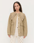 James Quilted Jacket in brown butter plaid cotton and Demi Embroidered Pant in natural denim.