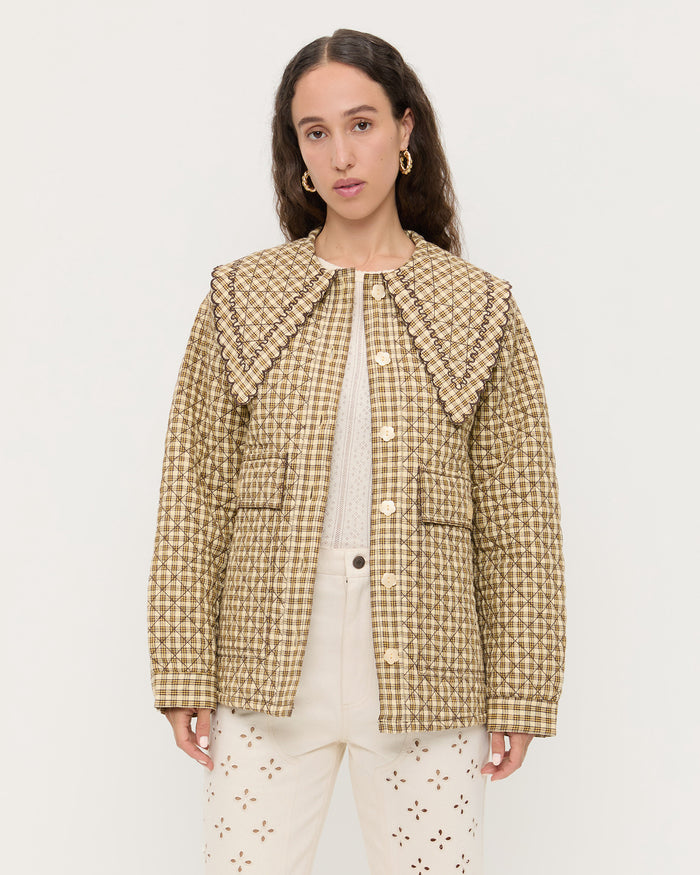 James Quilted Jacket in brown butter plaid cotton and Demi Embroidered Pant in natural denim.