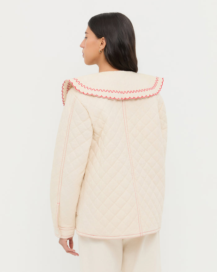 James Natural/Poppy Workwear Jacket in natural and red quilted cotton and Demi Embroidered Pant in natural cotton.
