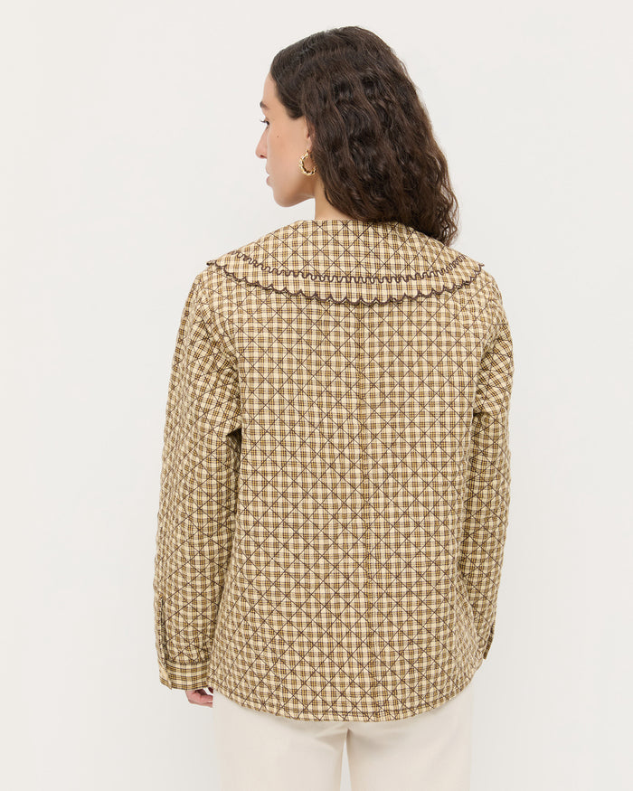 James Quilted Jacket in brown butter plaid cotton and Demi Embroidered Pant in natural denim.