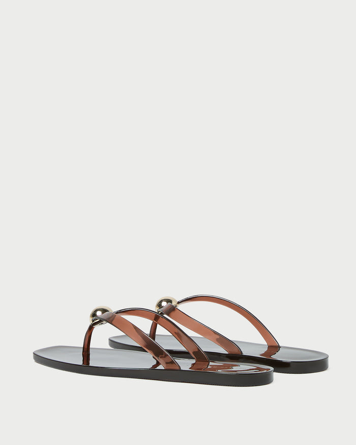 Jovie Brown Jelly Flip Flop in brown jelly with gold accent.