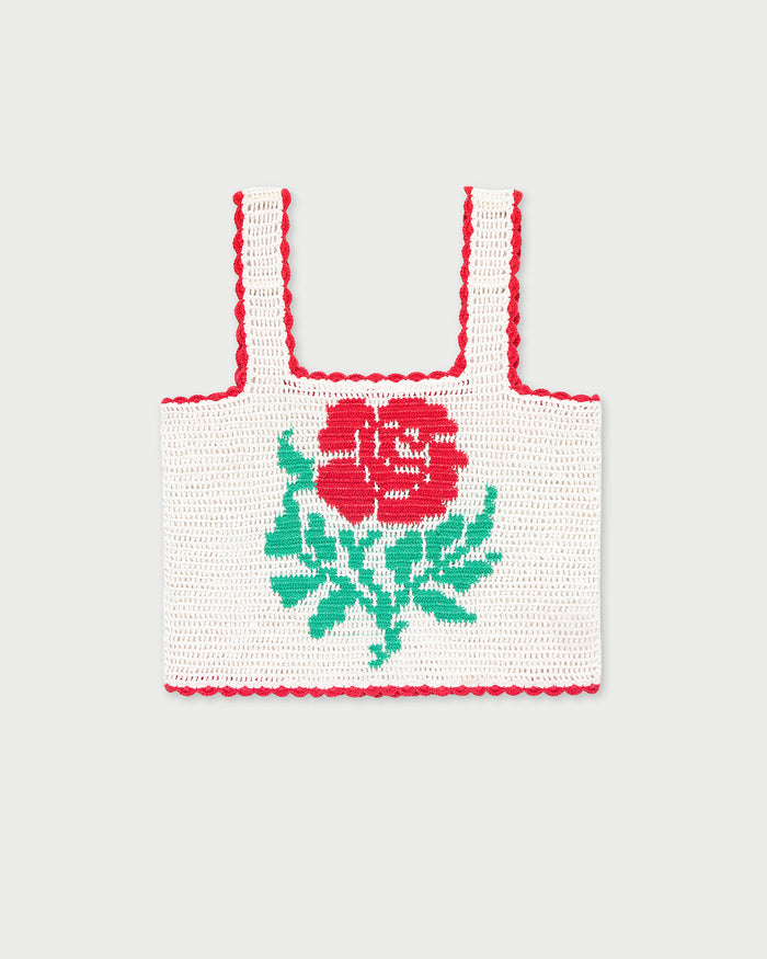 Juliette Top in white hand crocheted cotton with a flower accent.