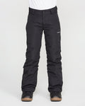 A person wearing black Volcom Kids’ Youth Freakin Chino Insulated Pants with an adjustable waist and black boots stands against a plain white background. The waterproof, breathable snow pants feature a small white Volcom logo on the left thigh. The person’s upper body is not visible.