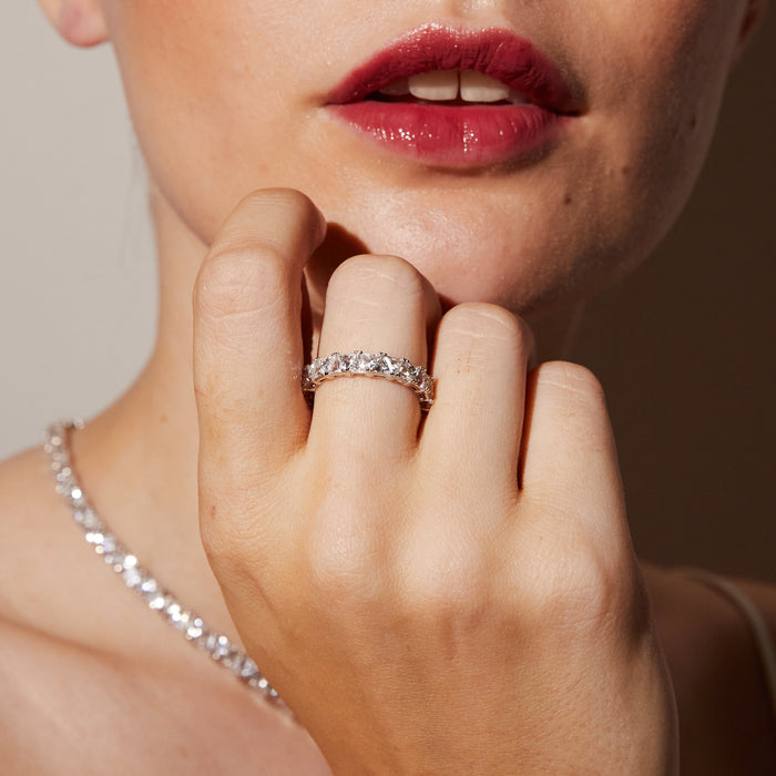 Model.  Close up of woman wearing diamond ring