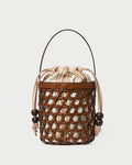 Laith Timber/Butter Bucket Bag with yellow and brown striped canvas and timber brown leather.