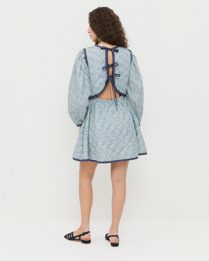Laney Short Dress in blue floral cotton and Shelly Navy Suede Flat Sandal.