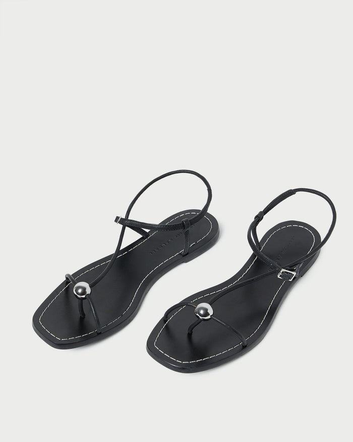 Lara Black Leather Sandal in black leather with a silver ball accent.