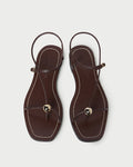 Lara Espresso Leather Sandal in espresso brown leather with a gold ball accent.