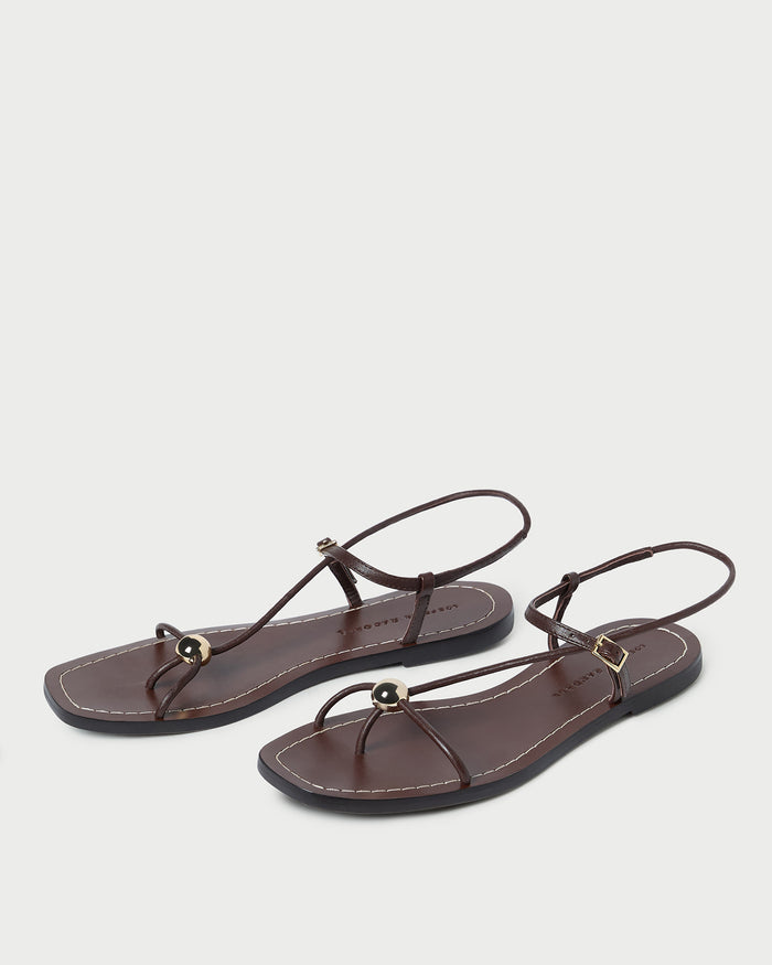 Lara Espresso Leather Sandal in espresso brown leather with a gold ball accent.