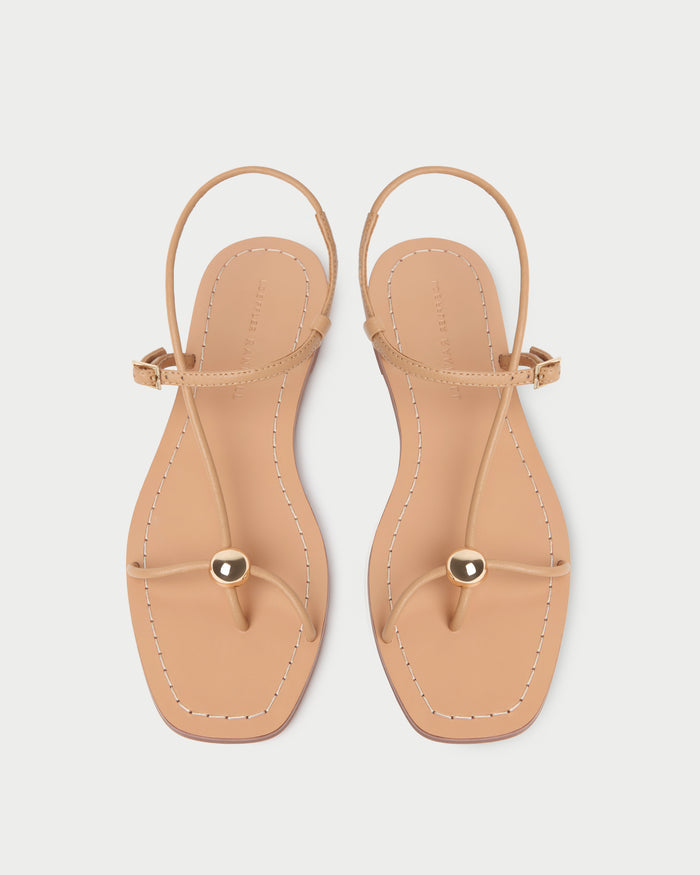 Lara Dune Leather Sandal in dune tan leather with a gold ball accent.
