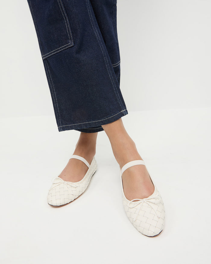 Leonie Cream Woven Ballet Flat in cream woven leather and Molly Workwear Pant in dark blue denim.