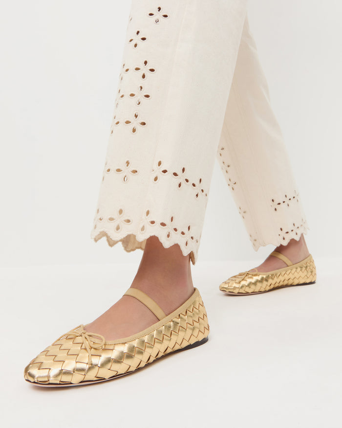 Leonie Gold Woven Ballet Flat in metallic gold woven leather and Demi Embroidered Pant in natural denim.