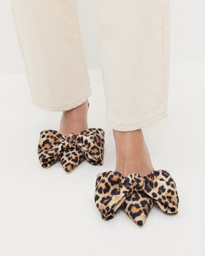 Margot Leopard Jersey Bow Mule in leopard print jersey and Winona Denim Barrel Pant in natural.