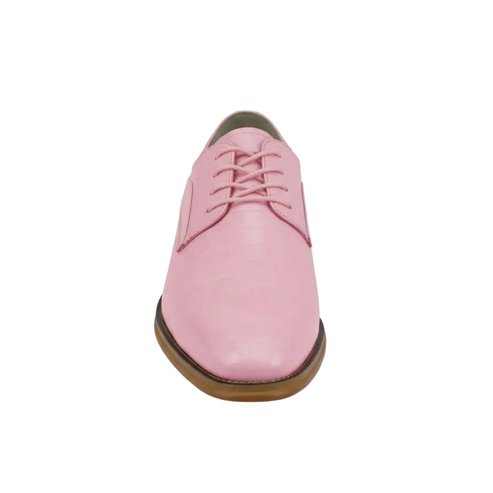 Pink leather shoe with brown sole on a white background