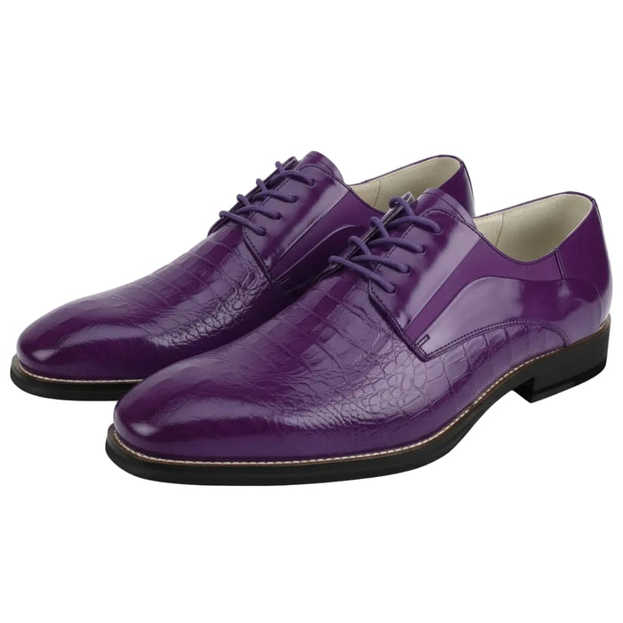 Pair of purple dress shoes on a white background