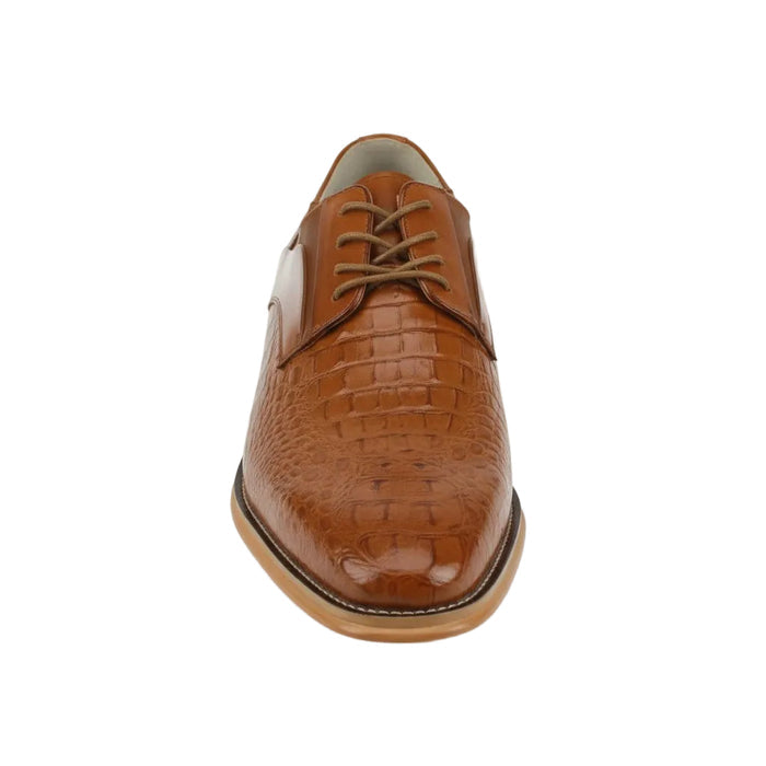 Tan leather dress shoe on a white background
