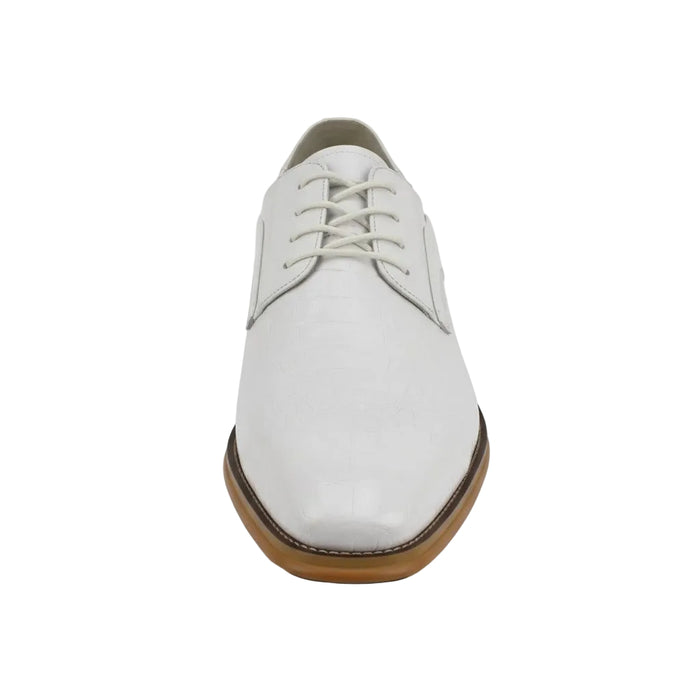 White leather shoe with brown sole on a white background