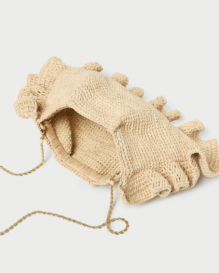 Mavis Natural Raffia Ruffle Clutch in natural raffia.
