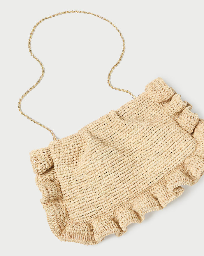 Mavis Natural Raffia Ruffle Clutch in natural raffia.